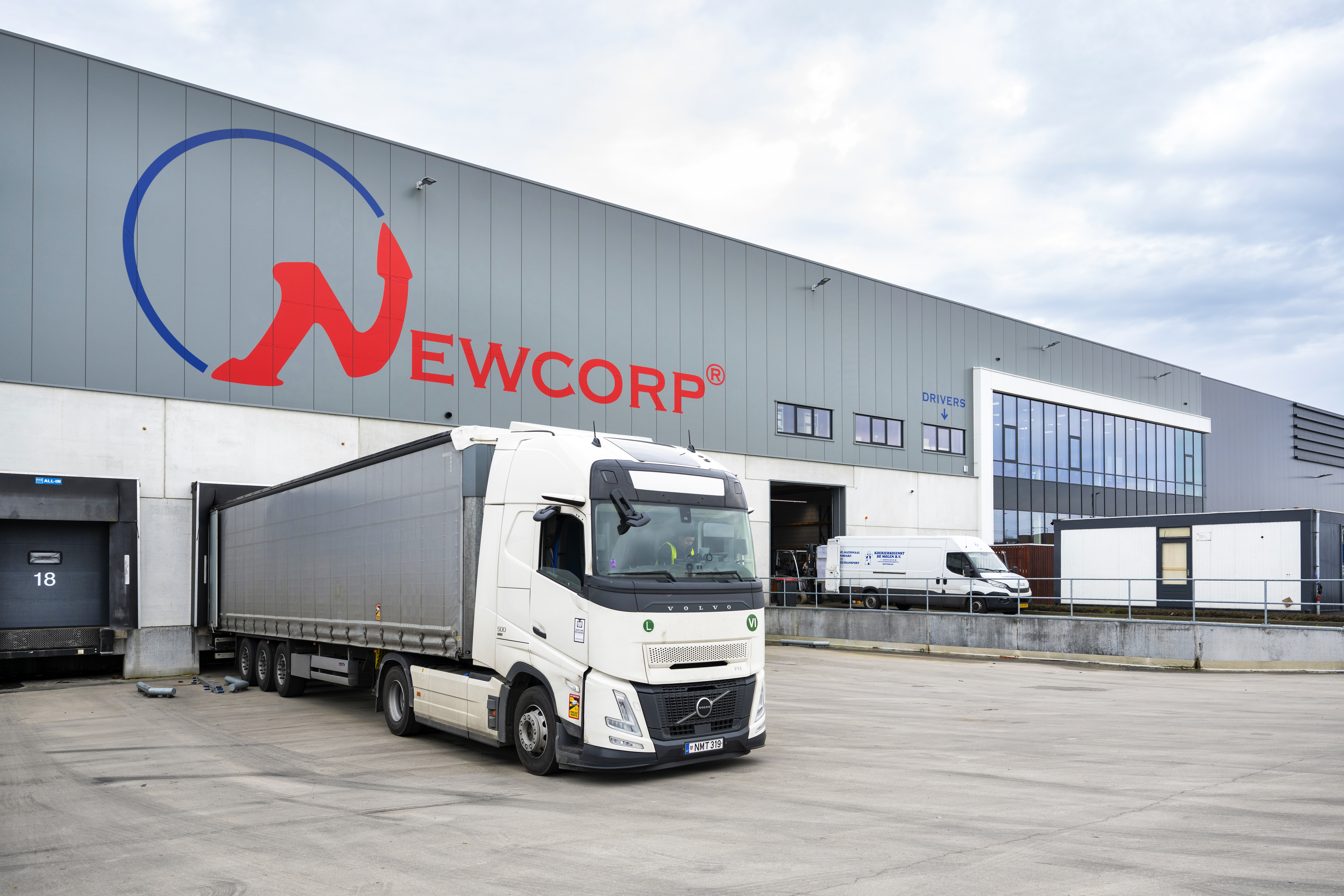 Warehouse employee managing inventory and ensuring accurate stock control